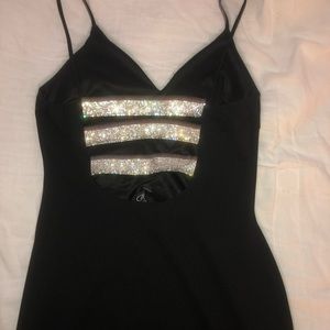 Black dress with a diamond back.